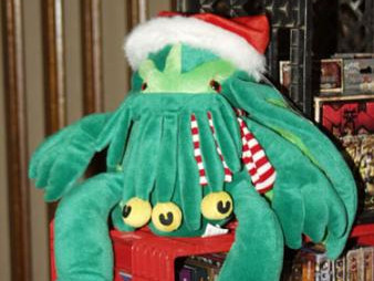 Santa Cthulhu plushie at an Exhibitor's booth
